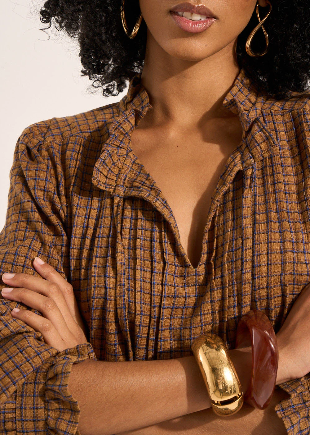 Blouse à carreaux à manches longues et volants